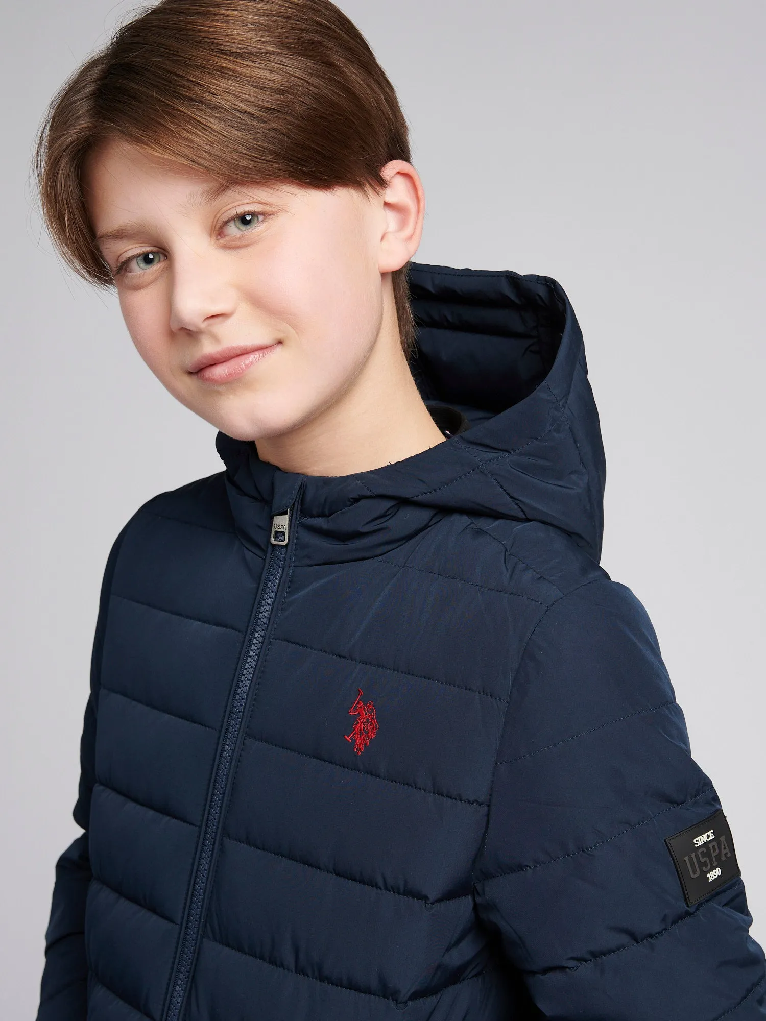 Boys Lightweight Quilt Hooded Puffer Jacket in Dark Sapphire Navy / Haute Red DHM